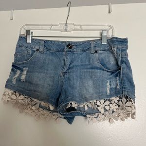 Adorable denim shorts with lace trim!